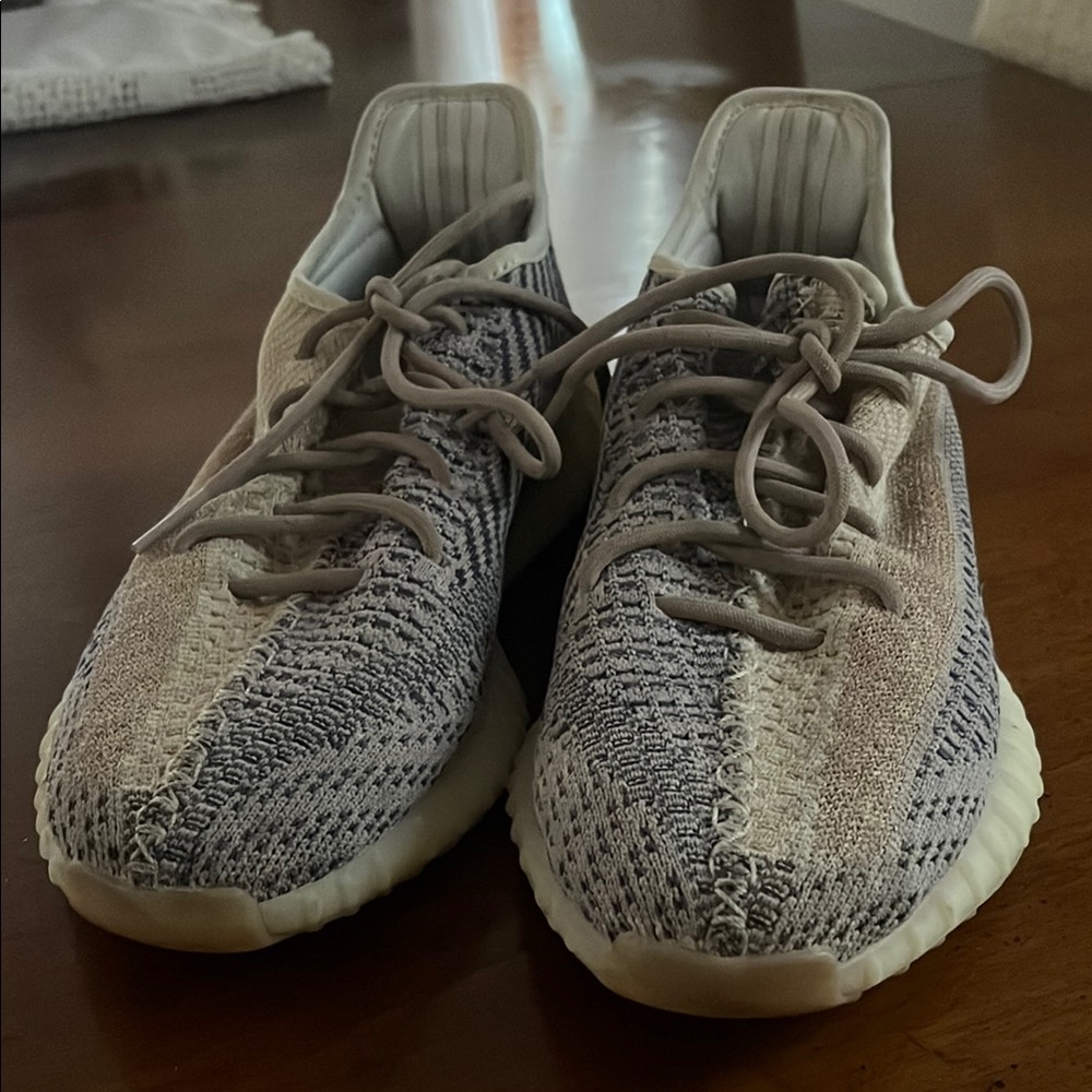 Adidas Yeezy boost 350 in Cream and Gray.
